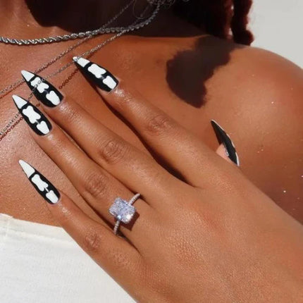 DESIGNER RADIANT RECTANGLE CUT DIAMOND RING